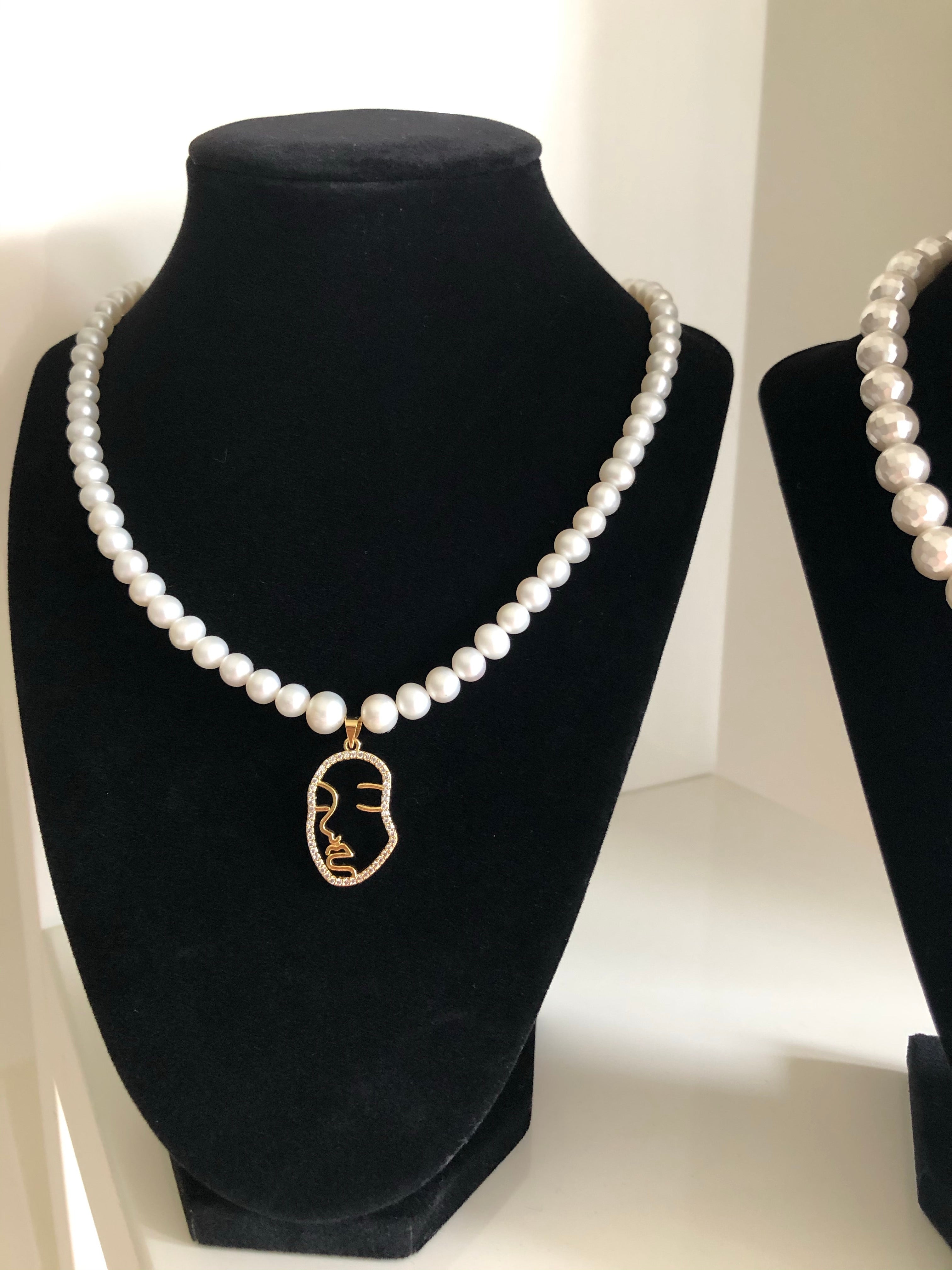 Handmade Pearl Necklace with Face Pendant
